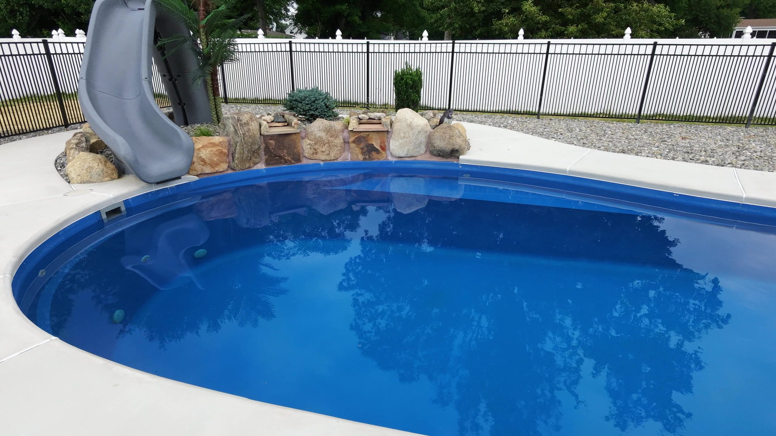 Fiberglass Pool & Pavilion | Bensalem, PA | fiberglass pool and landscaped boulders 3